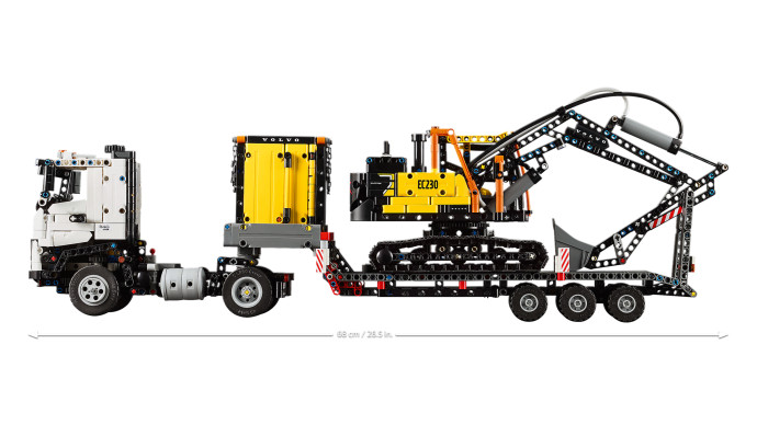 Nákladní auto Volvo FMX a elektrický bagr Volvo EC230