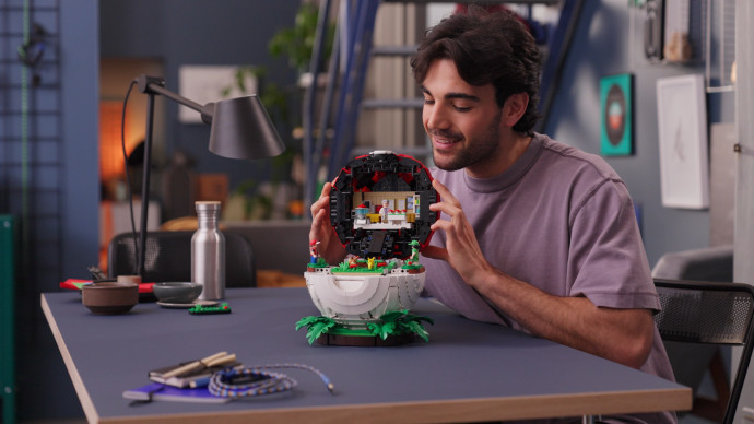 Poké Ball s ikonickými momentmi Trénerov
