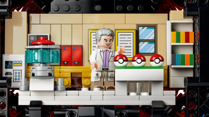 Poké Ball s ikonickými momentmi Trénerov